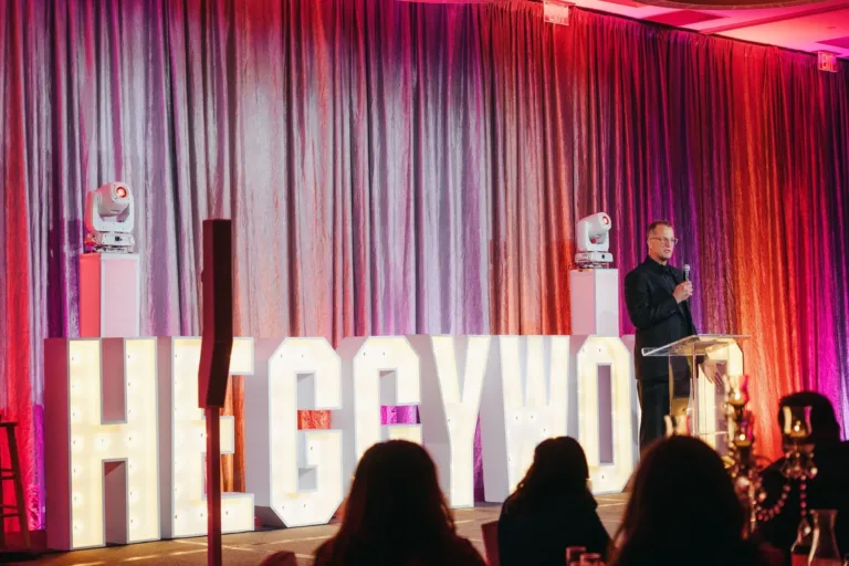 Paul Hegg on stage at Heggyworld event